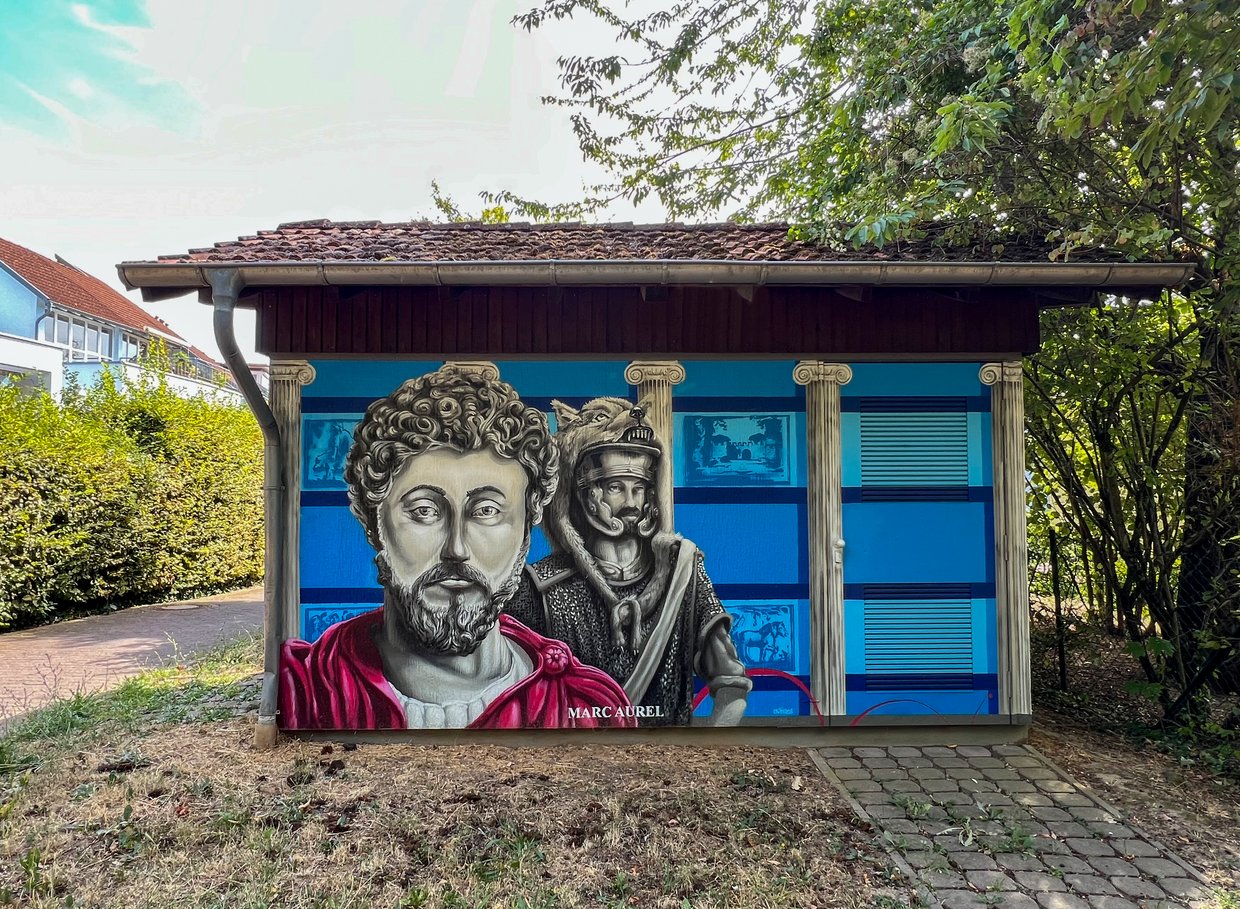 Auf der Darstellung ist das Graffiti von zwei römischen Legionären zu sehen.