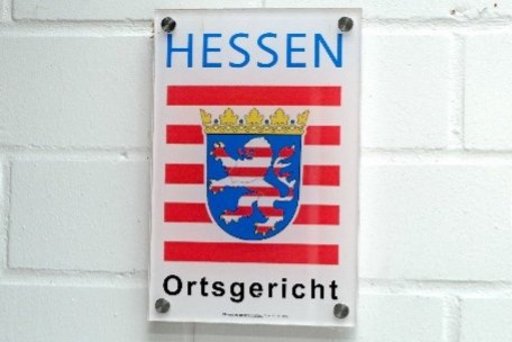 Das Bild zeigt das Schild des Ortsgerichtes in Hessen.